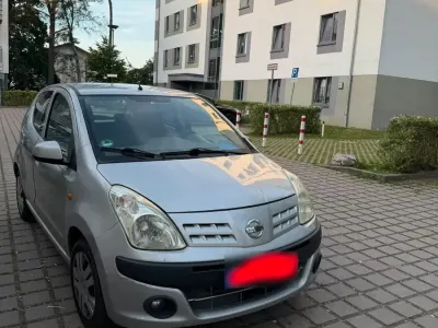 Gebraucht Nissan Pixo 68 PS (50 kW) 2010 Grau Kleinwagen