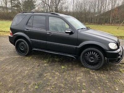 Begagnad Mercedes ML55 AMG AMG 347 HK (255 kW) 2003 Svart SUV