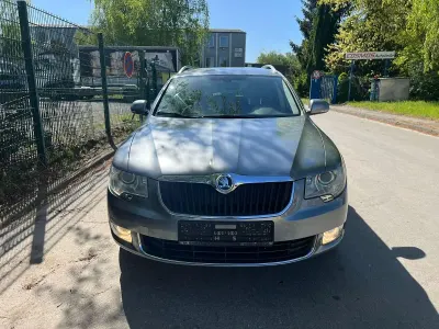Używany Skoda Superb Ambition 160 KM (117 kW) 2010 Srebrny Kombi