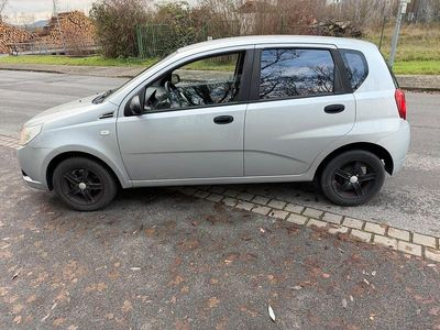 Second-hand Chevrolet Aveo 84 CP (61 kW) 2002 Argintiu Hatchback
