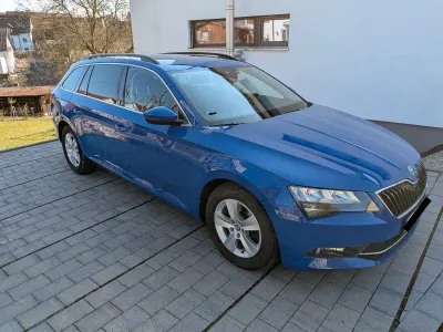 Używany Skoda Superb Ambition 150 KM (110 kW) 2019 Niebieski Kombi