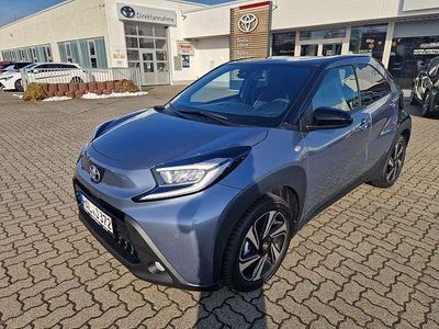 Gebraucht Toyota Aygo X Comfort 72 PS (52 kW) 2025 Celestite grey metallic / night sky black SUV
