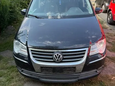 Gebraucht VW Touran Comfortline 140 PS (102 kW) 2010 Schwarz Van / Kleinbus