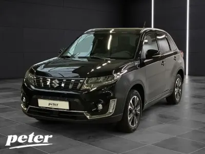 Gebraucht Suzuki Vitara Comfort 102 PS (75 kW) 2024 Cosmic black pearl met. SUV