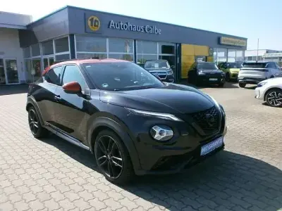 Gebraucht Nissan Juke Tekna 114 PS (83 kW) 2021 Black / sunset red (metallic) SUV