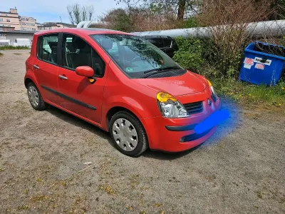 Używany Renault Modus 75 KM (55 kW) 2006 Czerwony Minivan