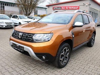 Używany Dacia Duster 116 KM (85 kW) 2021 Pomarańczowy SUV
