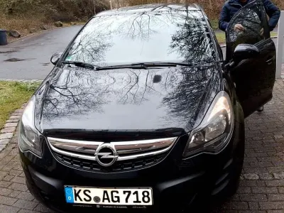 Używany Opel Corsa Color Edition 69 KM (50 kW) 2013 Czarny Hatchback