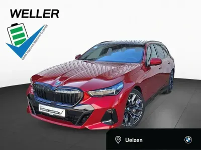 Second-hand BMW 550e M Sport 489 CP (359 kW) 2025 Roșu Break
