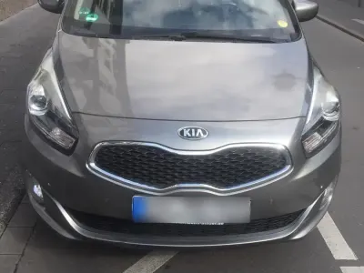 Gebraucht Kia Carens 136 PS (100 kW) 2015 Grau Van / Kleinbus