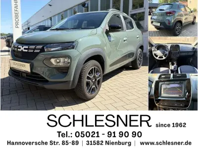 Gebraucht Dacia Spring Essentiel 33 kW (45 PS) 2023 Olivgrün Kleinwagen