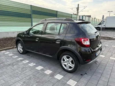 Gebraucht Dacia Sandero Prestige 90 PS (66 kW) 2015 Braun Limousine
