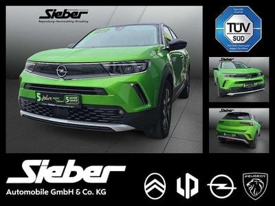 Gebraucht Opel Mokka-e Elegance 100 kW (136 PS) 2022 Matcha green/ikone gruen SUV