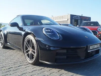 Gebraucht Porsche 992 394 PS (289 kW) 2025 Schwarz Coupé