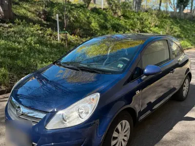 Używany Opel Corsa 60 KM (44 kW) 2009 Niebieski Hatchback