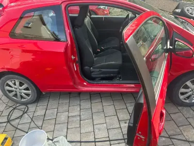 Używany Toyota Yaris 69 KM (50 kW) 2012 Czerwony Hatchback