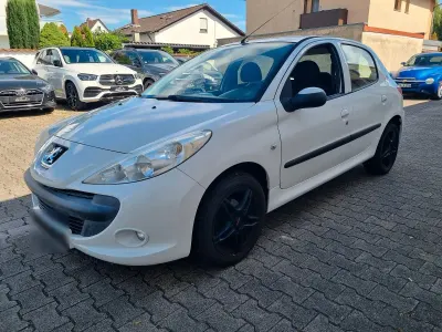 Gebraucht Peugeot 206 73 PS (53 kW) 2011 Weiß Limousine