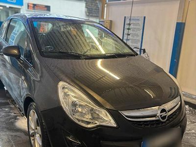 Gebraucht Opel Corsa Active 69 PS (50 kW) 2012 Grau Kleinwagen