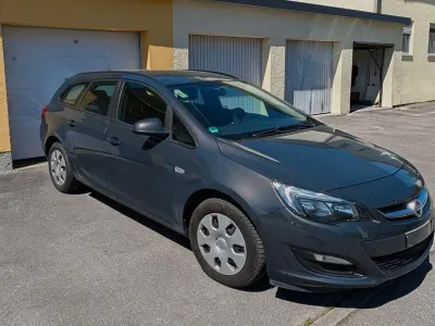 Używany Opel Astra Sport 110 KM (80 kW) 2014 Szary Kombi