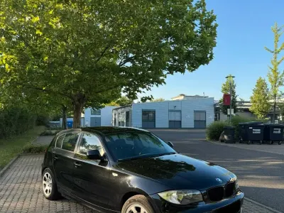 Gebraucht BMW 116 122 PS (89 kW) 2010 Schwarz Kleinwagen