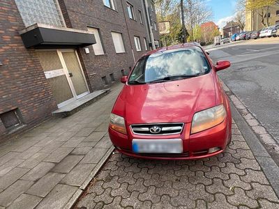 Second-hand Chevrolet Kalos 69 CP (50 kW) 2004 Roșu Hatchback