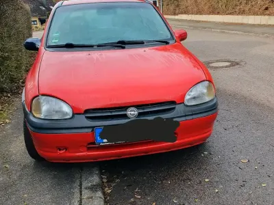 Używany Opel Corsa 60 KM (44 kW) 1996 Czerwony Hatchback