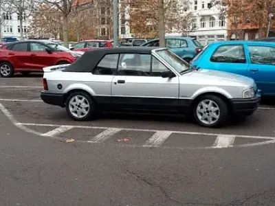 Gebraucht Ford Escort Cabriolet 105 PS (77 kW) 1989 Silber Cabrio
