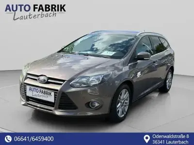 Gebraucht Ford Focus Champions Edition 125 PS (91 kW) 2012 Braun Limousine