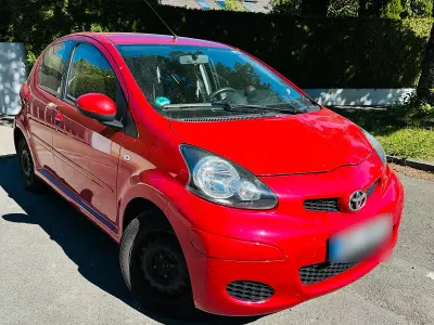 Second-hand Toyota Aygo 68 CP (50 kW) 2010 Roșu Hatchback
