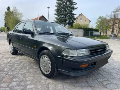 Begagnad Toyota Carina II 98 HK (72 kW) 1992 Grå Sedan