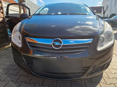 Używany Opel Corsa Edition 75 KM (55 kW) 2010 Czarny Hatchback