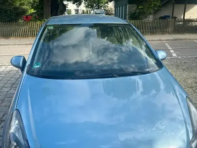 Gebraucht Opel Corsa 78 PS (57 kW) 2013 Blau Kleinwagen