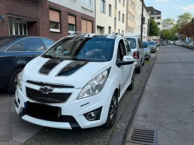 Używany Chevrolet Spark 68 KM (50 kW) 2011 Biały Hatchback