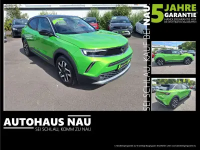 Gebraucht Opel Mokka Elegance 131 PS (96 kW) 2023 Matcha green SUV