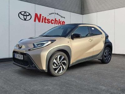 Gebraucht Toyota Aygo X Basis 72 PS (52 kW) 2025 Ginger beige (4u9)/ black mica SUV