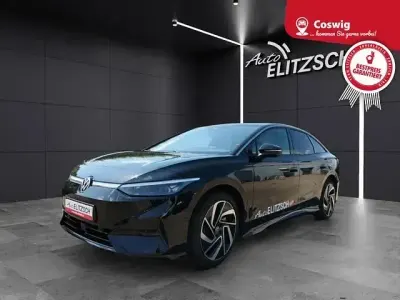 Gebraucht VW ID.7 Pro 210 kW (286 PS) 2023 Grenadillschwarz metallic Kleinwagen