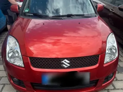 Gebraucht Suzuki Swift 93 PS (68 kW) 2009 Orange Kleinwagen