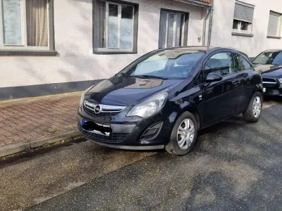 Gebraucht Opel Corsa Active 69 PS (50 kW) 2013 Schwarz Kleinwagen