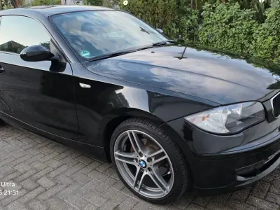 Gebraucht BMW 116 Performance 122 PS (89 kW) 2009 Schwarz Kleinwagen