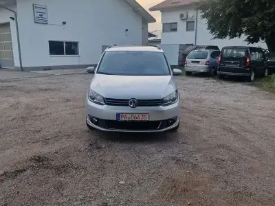 Gebraucht VW Touran Comfortline 105 PS (77 kW) 2013 Reflexsilber metallic Van / Kleinbus