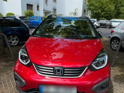 Gebraucht Honda Jazz Hybrid 105 PS (77 kW) 2021 Rot Kleinwagen
