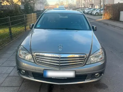 Używany Mercedes C230 204 KM (150 kW) 2009 Szary Kombi