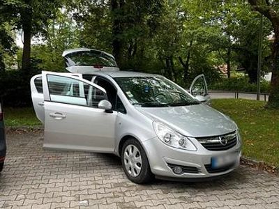 Second-hand Opel Corsa 90 CP (66 kW) 2009 Argintiu Hatchback