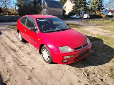 Gebraucht Mazda 323C 88 PS (64 kW) 1995 Rot Kleinwagen
