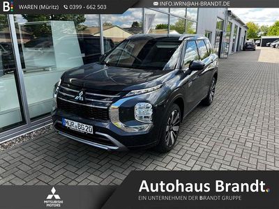 Grau Gebraucht 2025 Mitsubishi Outlander P-HEV Top SUV | 50.900 € (Fairer Preis)