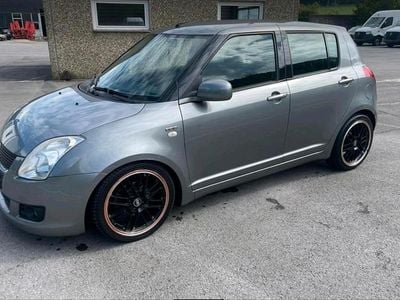 Gebraucht Suzuki Swift 75 PS (55 kW) 2012 Grau Kleinwagen