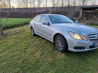 Second-hand Mercedes E200 184 CP (135 kW) 2011 Argintiu Berlinǎ