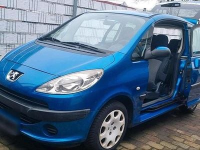 Second-hand Peugeot 1007 74 CP (54 kW) 2006 Albastru Monovolum
