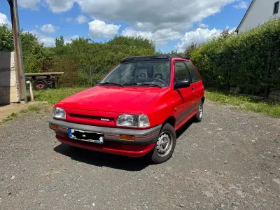 Gebraucht Mazda 121 55 PS (40 kW) 1990 Rot Kleinwagen