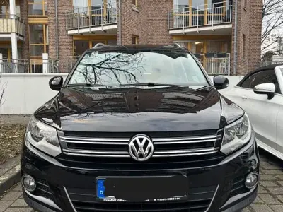 Używany VW Tiguan Sport 110 KM (80 kW) 2014 Czarny SUV